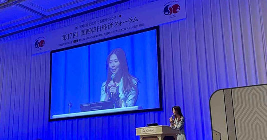 フォーラムで講演する文代表